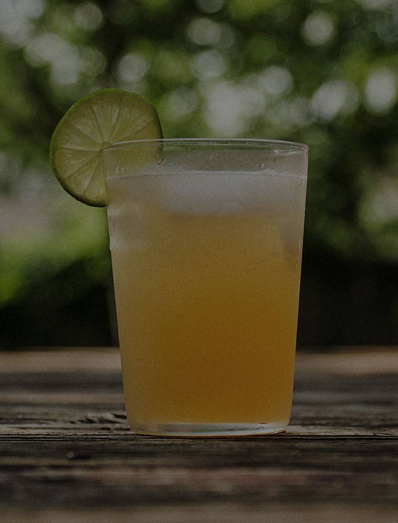 Sons of Mitch's Tennessee Whiskey cocktail recipe with ice and lime wedge